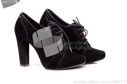 Image of Woman black shoes on the white background