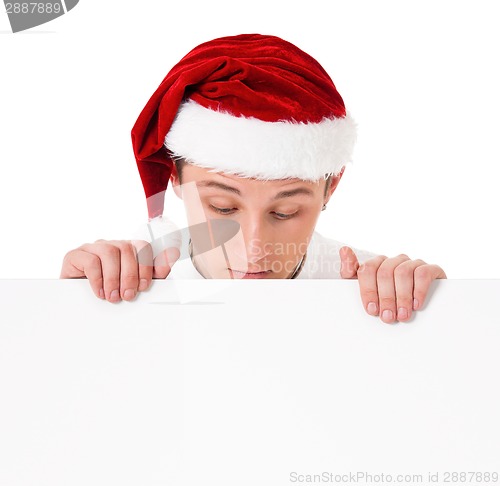 Image of Young man in Santa hat