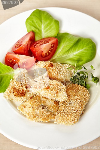 Image of roasted fish fillet covered with sesame seeds