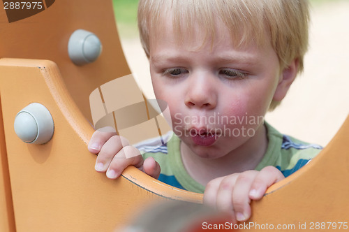 Image of Young boy on playground