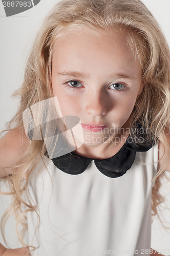 Image of Pretty little girl in white