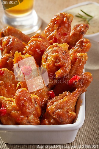 Image of fried chicken wings with sweet chili sauce