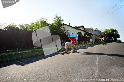 Image of Longboarding Teens