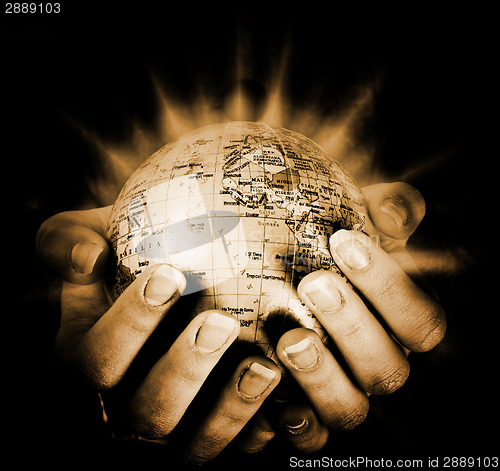 Image of Globe in a girl's hands