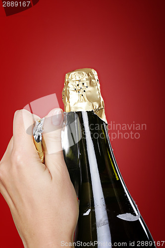 Image of Opening champagne bottle