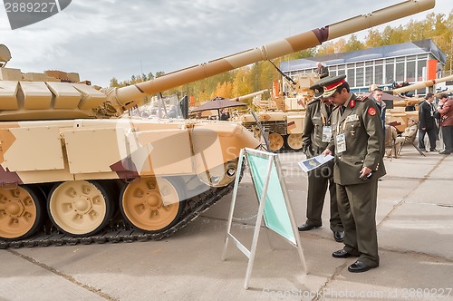 Image of Officers of foreign army studies tank T-72. Russia