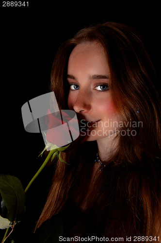 Image of Woman with red rose.