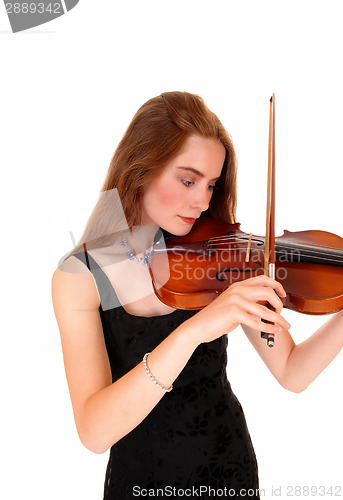Image of Woman playing the violin.