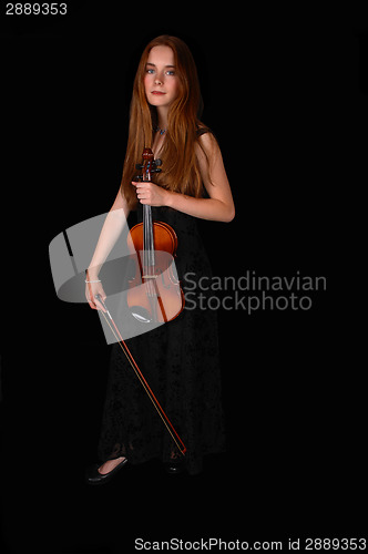 Image of Standing woman with violin.