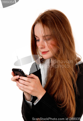 Image of Woman texting on phone.