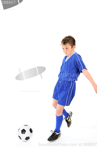 Image of Child playing soccer