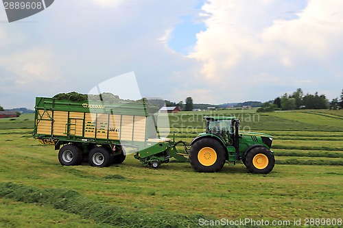 Image of John Deere 6210R Tractor and Full Krone MX 350 GL Forage Wagon