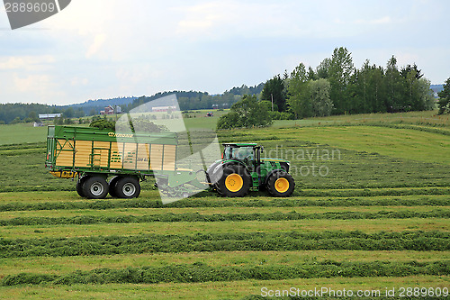 Image of John Deere 6210R Tractor and Full Krone MX 350 GL Forage Wagon