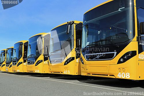 Image of Row of Yellow Volvo 8900 Intercity Buses