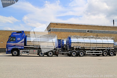 Image of Volvo Tanker Truck Parked outside Warehouse Building