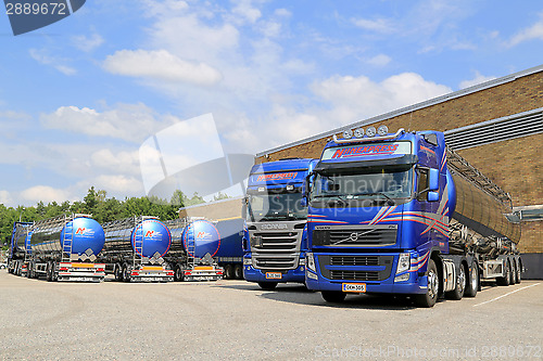 Image of Fleet of Tanker Trucks on a Yard