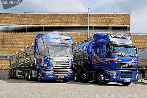 Image of Blue Scania and Volvo Tanker Trucks 