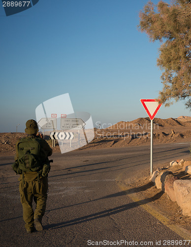 Image of Soldiers patrol in desert