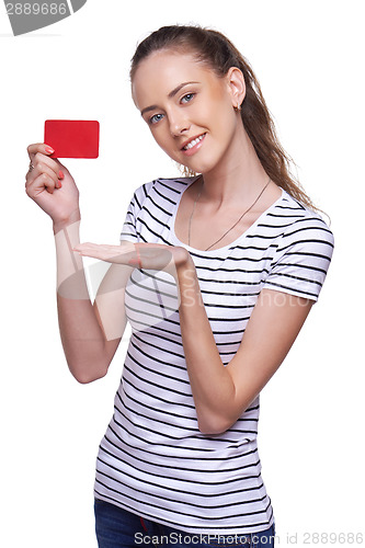 Image of Happy smiling female showing blank credit card