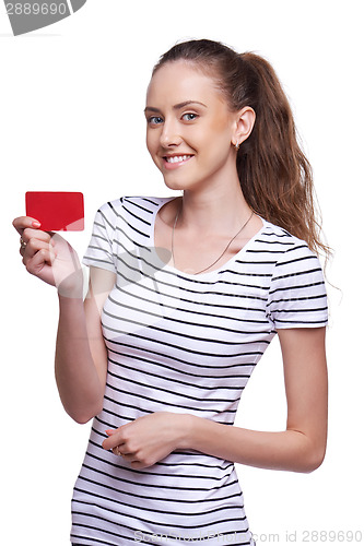 Image of Happy smiling female showing blank credit card