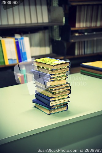 Image of Stack of books on the table