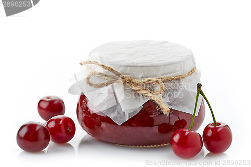 Image of jar of fruit jam with cherries
