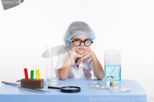 Image of Girl bored chemist