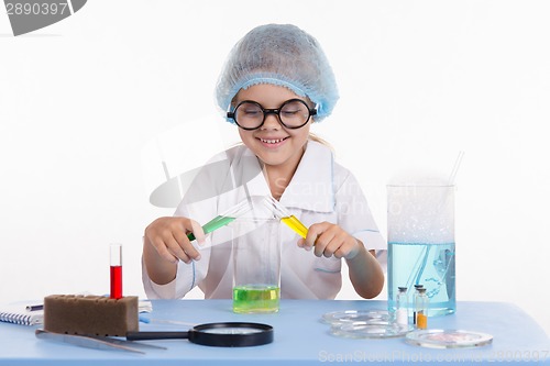 Image of Young chemist in glasses posing experience