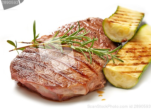 Image of grilled beef steak and zucchini