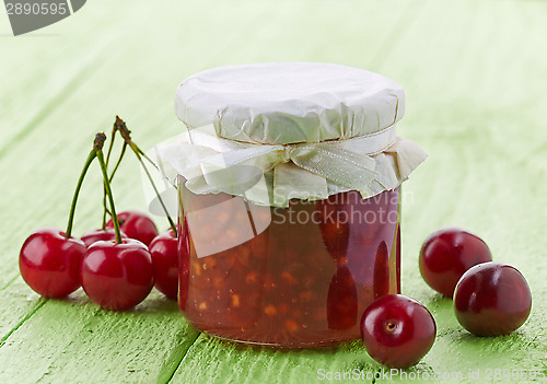 Image of jar of cherry and apple jam