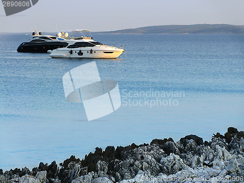 Image of Luxury yachts at sunset