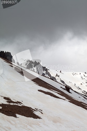 Image of Snowy mountains in bad weather