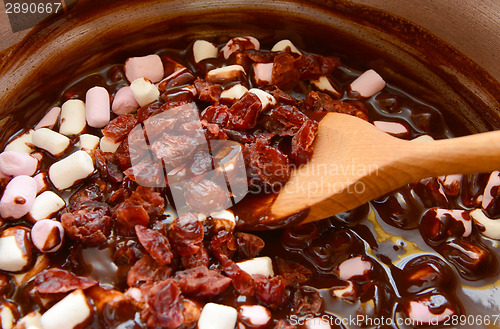 Image of Dried cranberries, marshmallows and melted chocolate