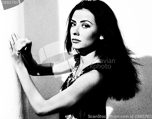 Image of BW portrait of beautiful young girl in dress