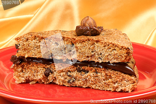 Image of Slice of hazelnut and chocolate cream cake