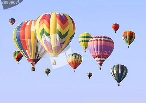 Image of A group of colorful hot-air balloons floating
