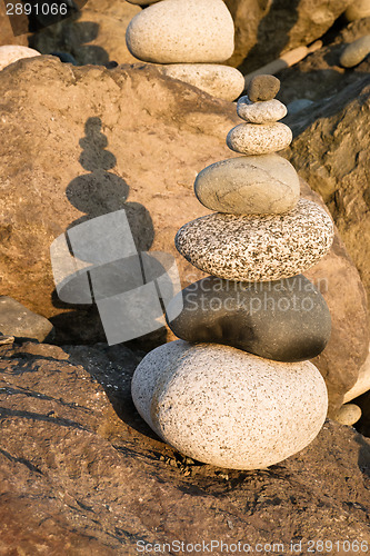 Image of Beach Rock Stacking Balancing Vertical Composition