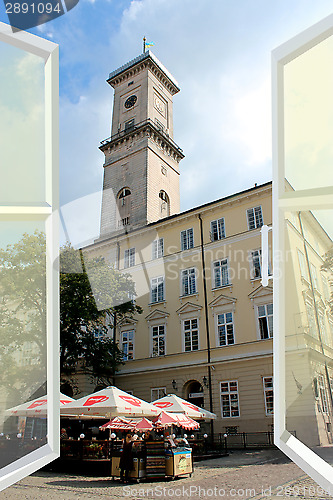 Image of opened window to the tower of city hall of Lvov