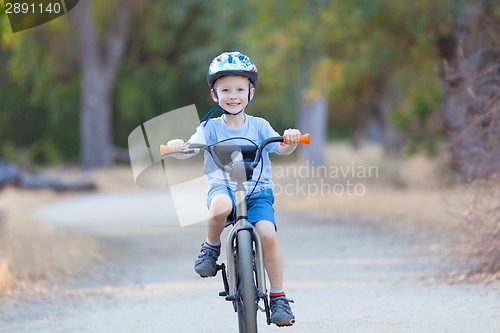 Image of kid riding bicycle
