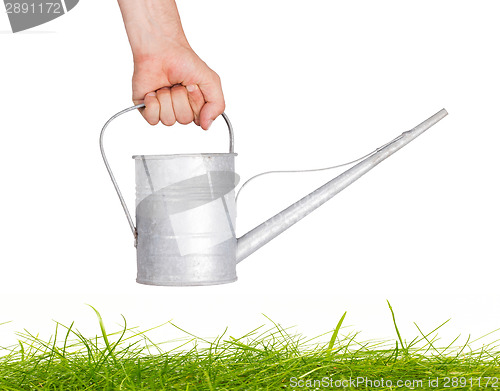 Image of Aged metallic watering can isolated