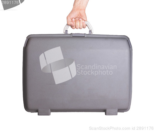 Image of Used plastic suitcase with stains and scratches
