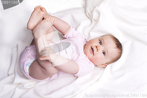 Image of Baby girl looks into the camera