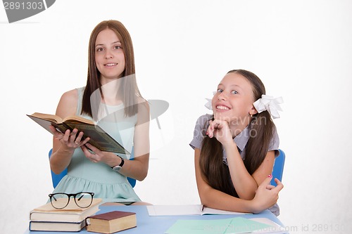 Image of Trainee teacher listens with interest