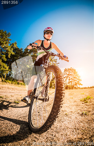 Image of Women on bike