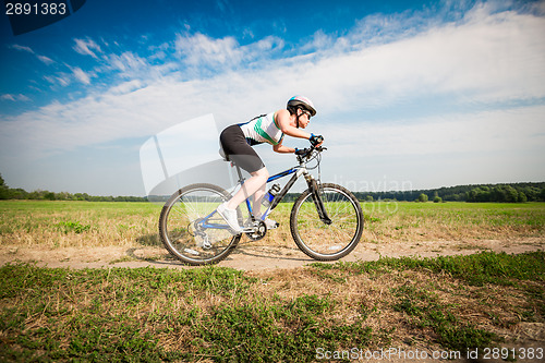 Image of Women on bike