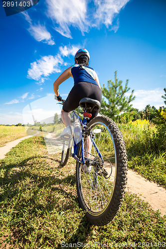 Image of Women on bike