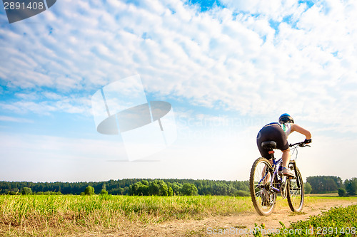 Image of Women on bike