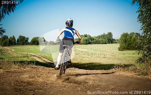 Image of Women on bike