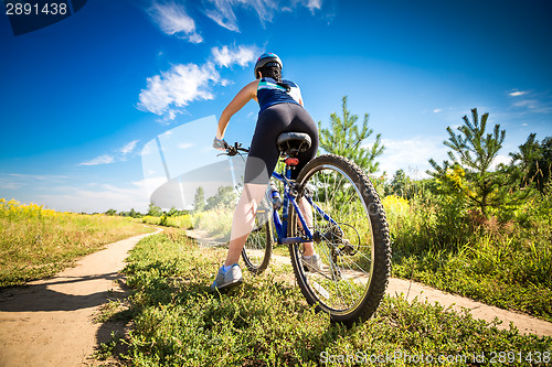 Image of Women on bike