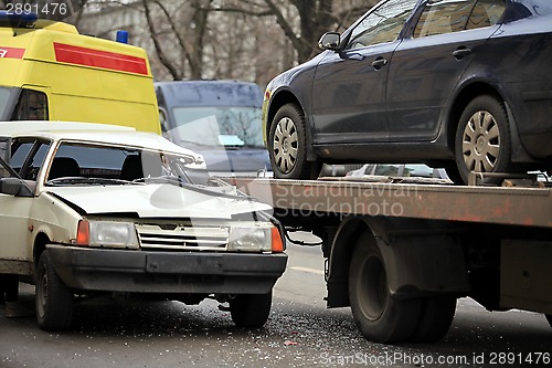 Image of  incredible collision of a passenger car and a tow truck